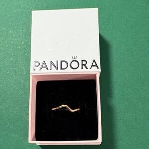 Pandora rose gold plated wave ring.